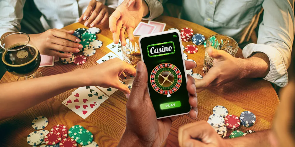 Casino spel med mobil i förgrunden