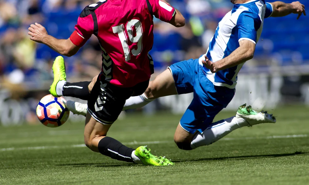 Fotbollsmatch - kamp om bollen